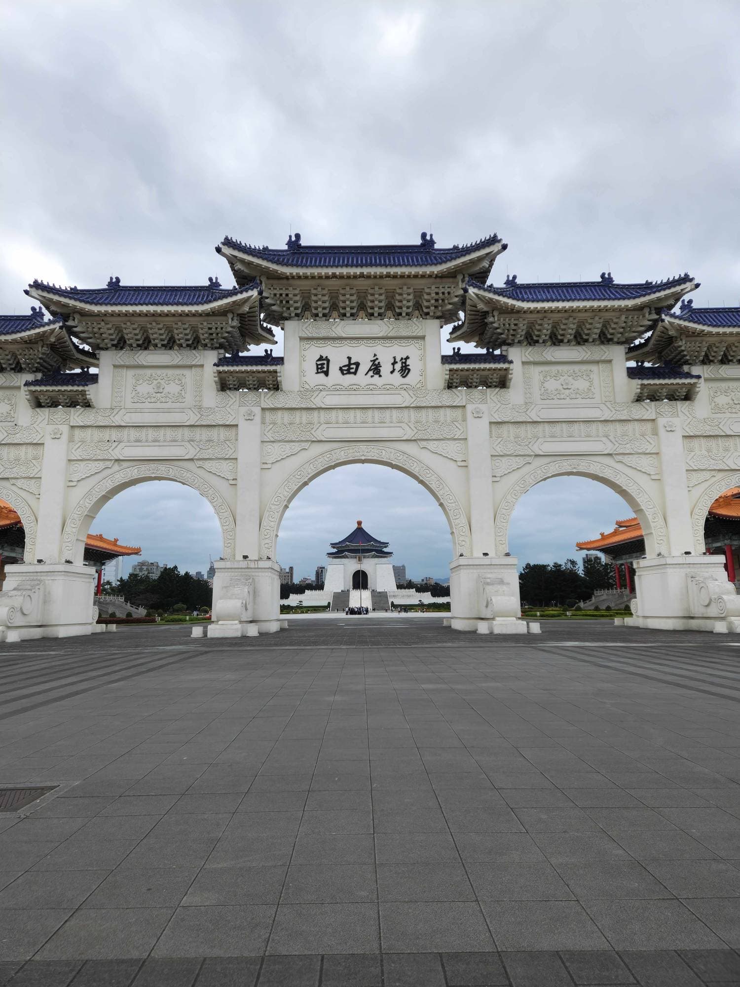 Traditional Chinese memorial gate representing institutional wisdom
